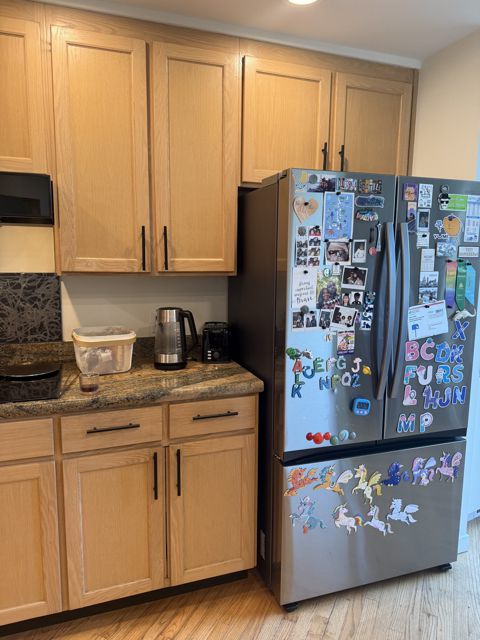 Refrigerator wall with cabinets