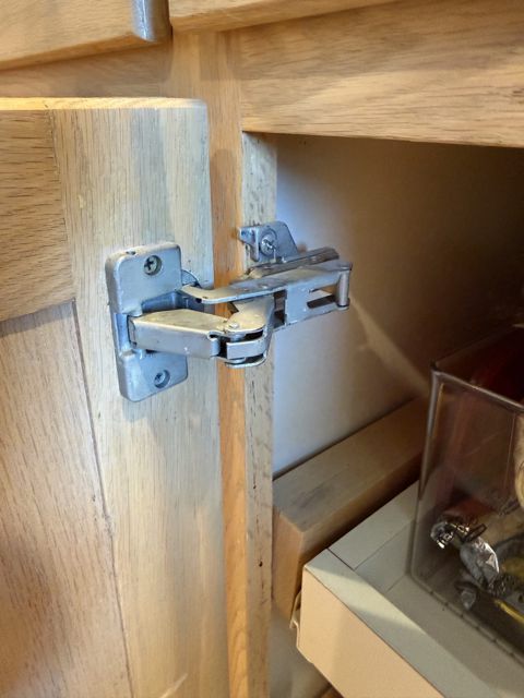 Cabinet cup hinge pulling away from a split door stile